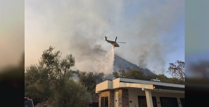Fethiye'deki orman dışı alanda çıkan yangın kontrol altına alındı, soğutma çalışmaları sürüyor