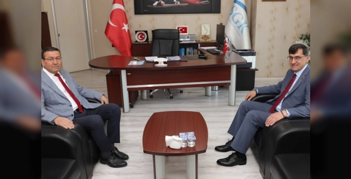 Kütahya'da Başkan Kahveci, SGK İl Müdürü Sayar'ı ziyaret etti
